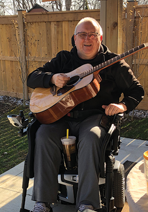 Bill Russell playing the guitar